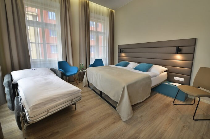 Exemple de lit supplémentaire (extra-bed) dans une chambre double