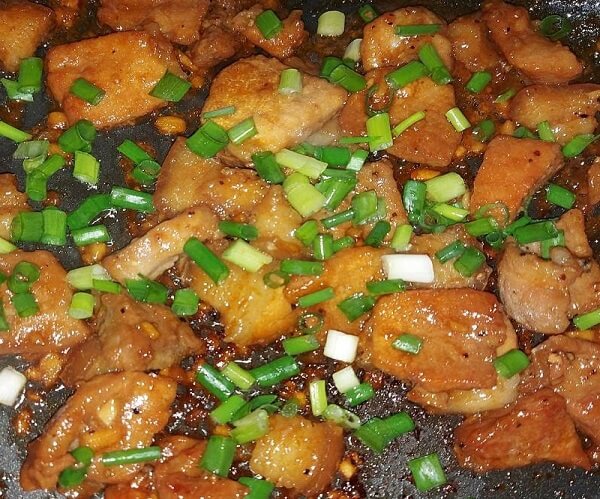 Ajouter les oignons verts à la fin